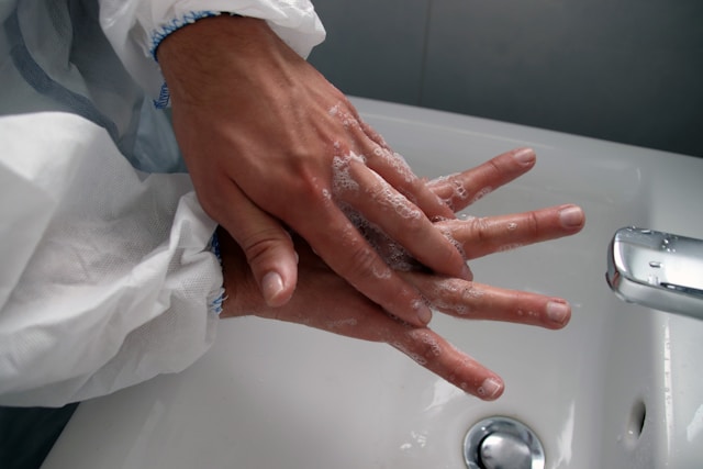 medical staff washing hands